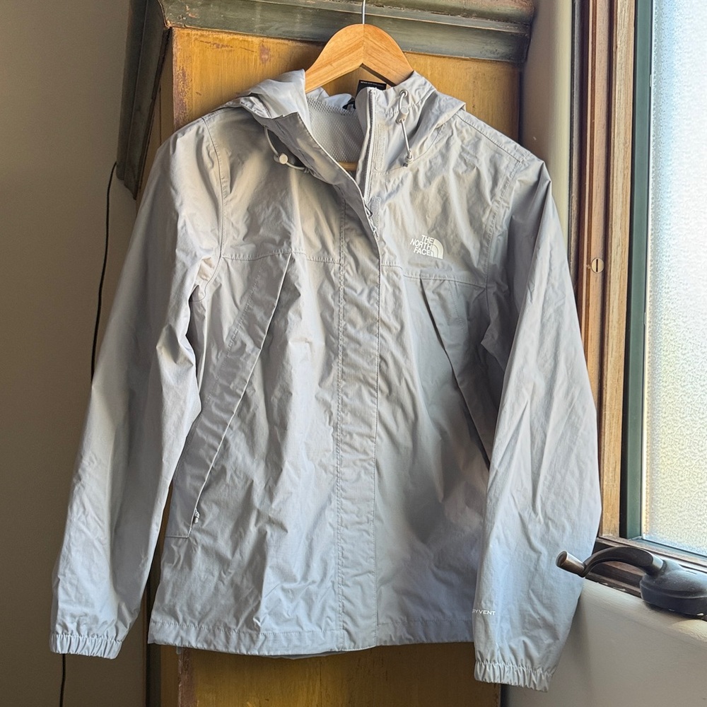The North Face rain jacket size small, never worn
